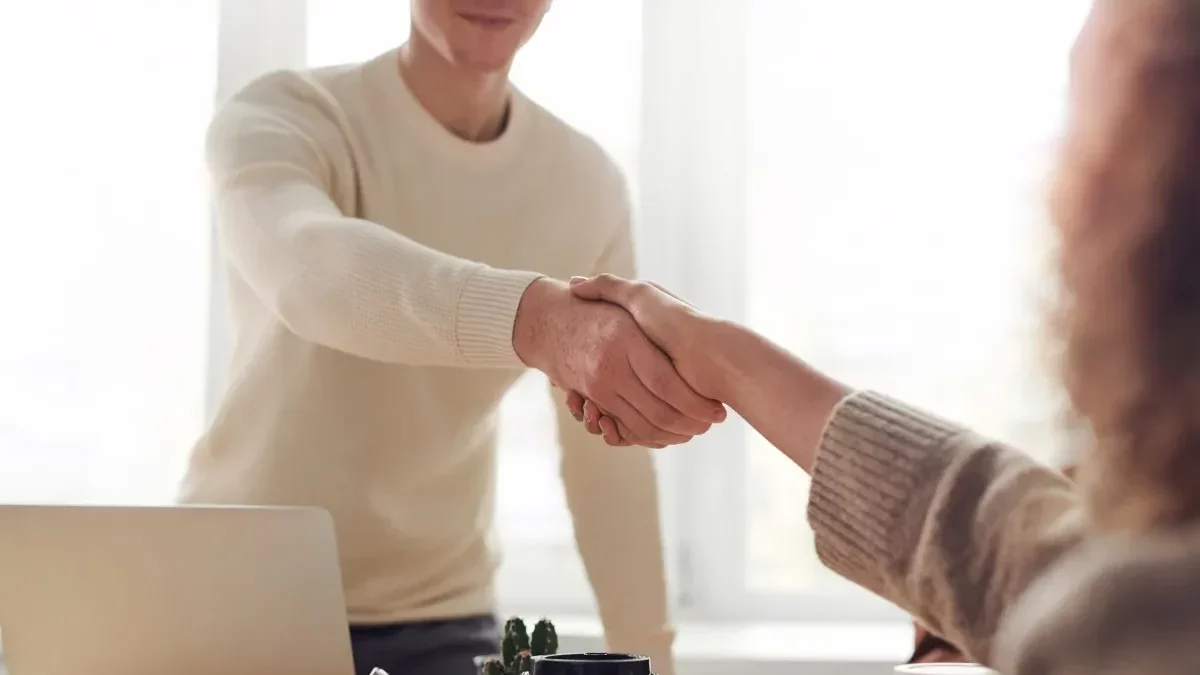 successful interview followed by a handshake